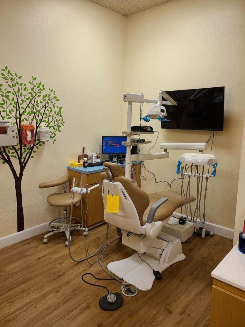 A dental clinic with brown dental chair